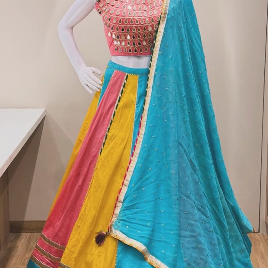 Playful multi block kalidar lehenga in coral mustard and teal