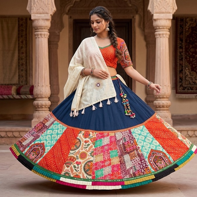 Model twirling in a colourful patchwork chaniya choli at Raas by Miral